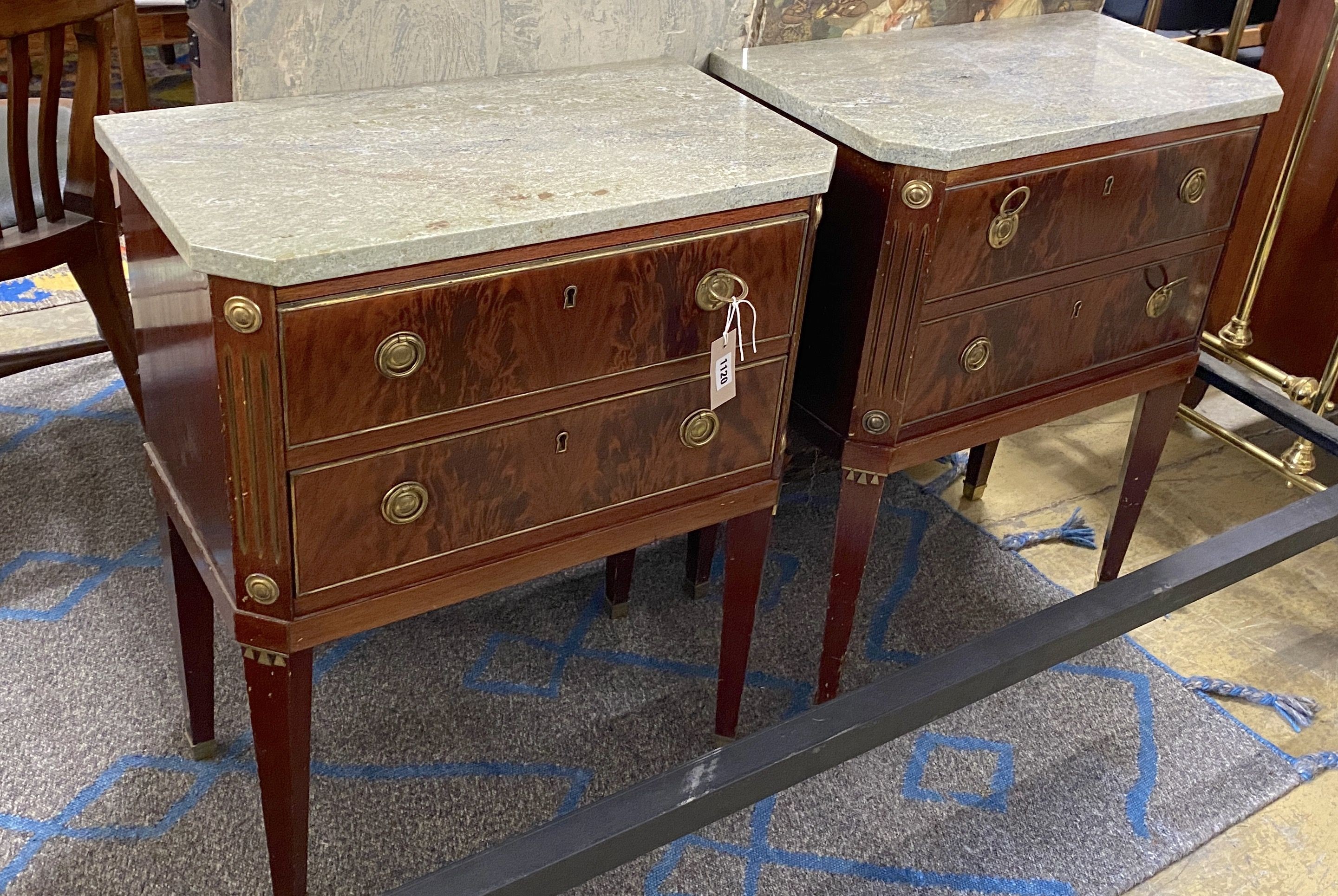 A pair of Louis XVI style gilt metal mounted mahogany marble topped two drawer bedside cupboards, width 59cm, depth 33cm, height 73cm